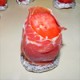 Bild - eine San Marzano Tomate zum Grillen vorbereitet